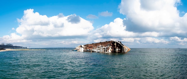 Sunken ship near the shore. Ship wreck, storm.