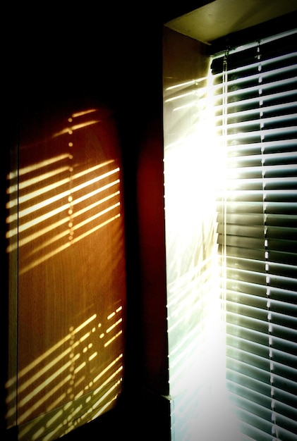 Sunlight falling through blinds