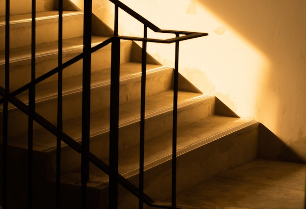 Sunlight shadow through concrete stair