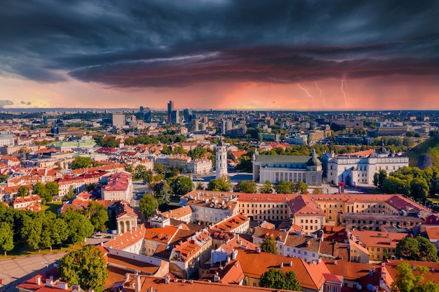 Sunny Aerial Vilnius Old Town aerial view scene. Red rooftops of Vilnius from the birds eye view - Vilnius - the capital of Lithuania