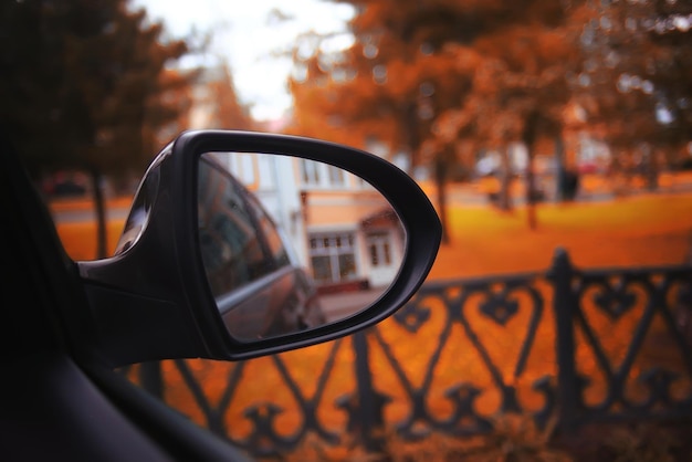 Sunny autumn day park car