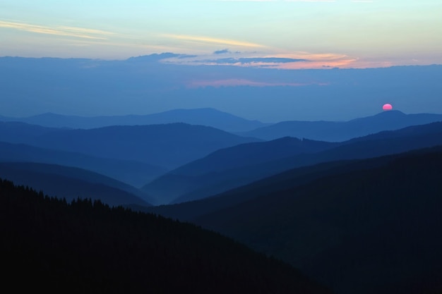 Sunny dawn on the mountain slopes