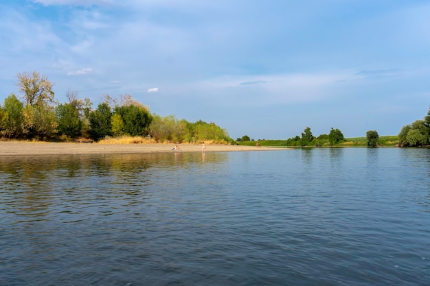 Sunny day on a calm river in summer