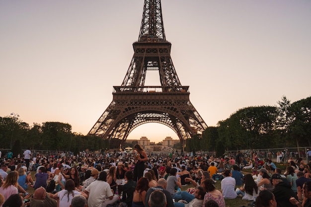 Sunny evening gathering at the eiffel tower