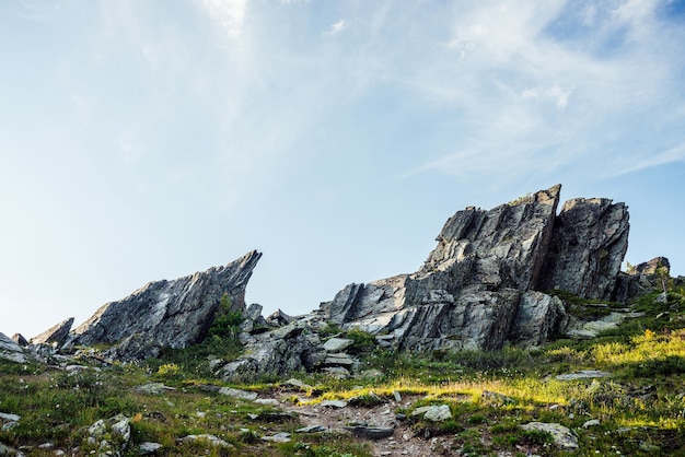 Sunny highland scenery with sharpened stones of unusual shape