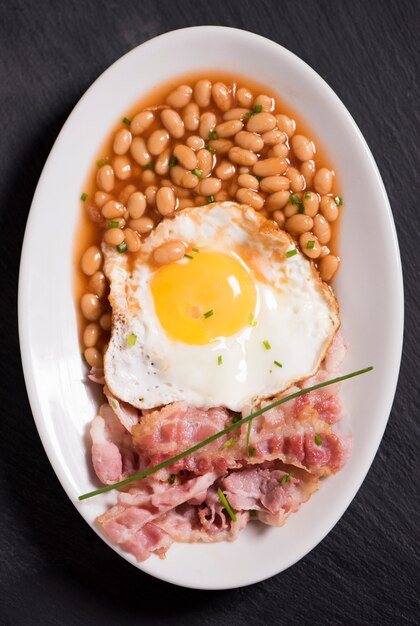 Sunny side up eggs with organic bacon, hashbrowns and crsipy toast