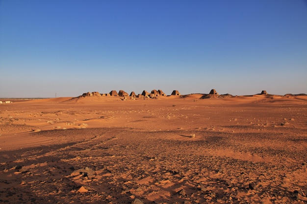 The sunrise, the ancient pyramids of Meroe in Sahara desert, Sudan