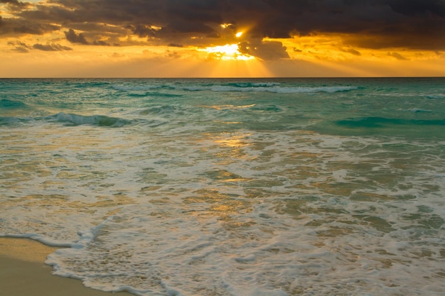 Sunrise over the beach on Caribbean Sea.