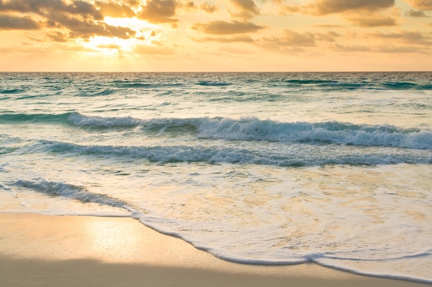 Sunrise over the beach on Caribbean Sea.