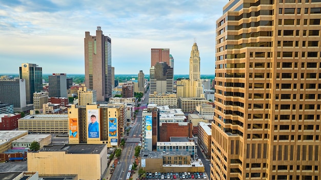 Photo sunrise blue lighting on downtown buildings in columbus ohio aerial with ads on buildings