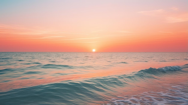 Sunrise over a calm ocean horizon with hues of orange and pink