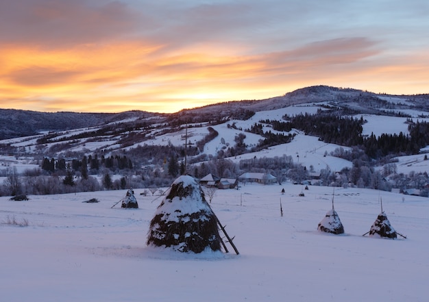 Sunrise Carpathian mountain winter landscape