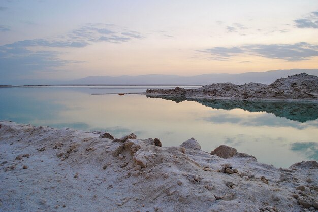 Sunrise over the Dead Sea shore in Israel. The lowest place on Earth. Salt crystals at sunrise