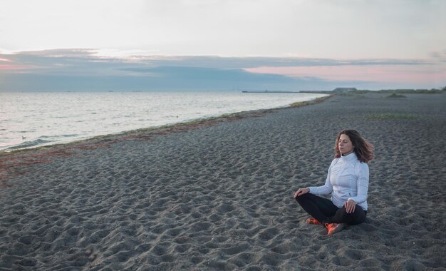 Sunrise mediation on the beach