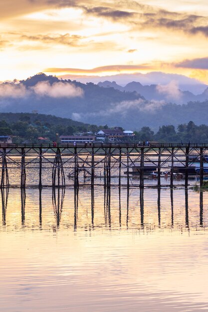 Sunrise or morning light Mon Bridge is the long wooden bridge