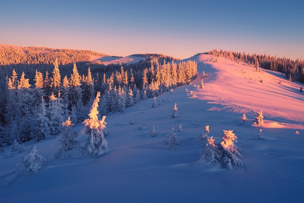 Sunrise in mountains in winter