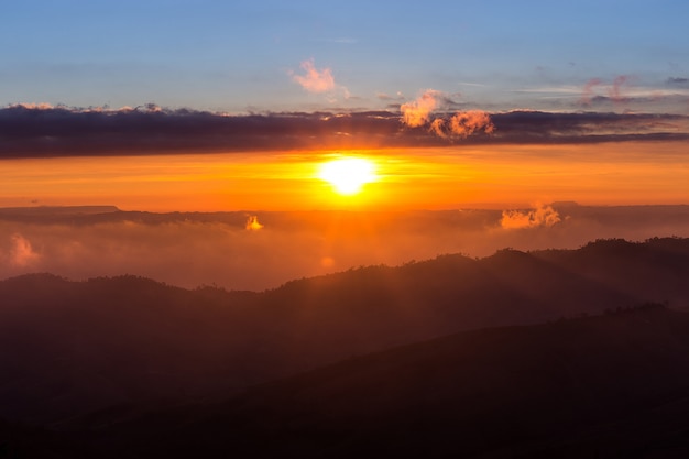 Sunrise on multi layer of high mountain