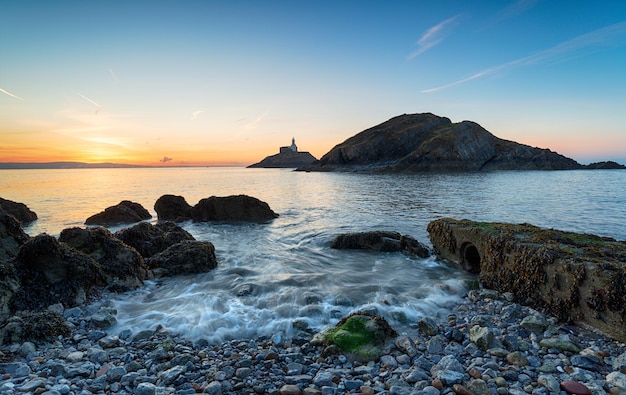 Photo sunrise at mumbles near swansea