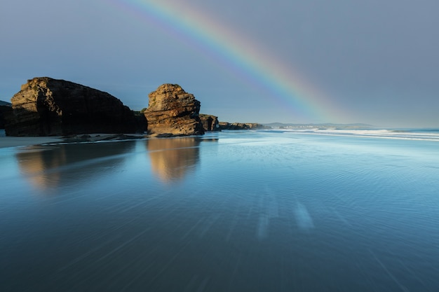 Sunrise at one of the most famous beaches in Spain, Las Catedrales!