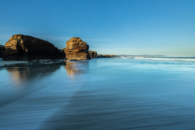 Sunrise at one of the most famous beaches in Spain, Las Catedrales!