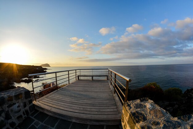 Sunrise on a Pier over Atlantic Ocean in Tenerife Canary Islands Spain