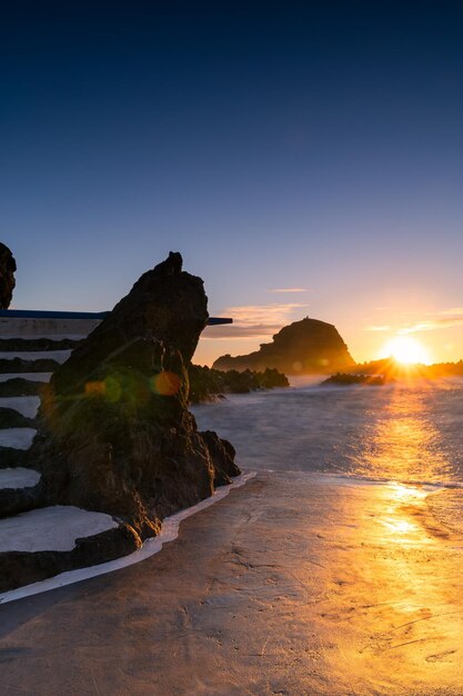 Sunrise above porto moniz madeira lava pools