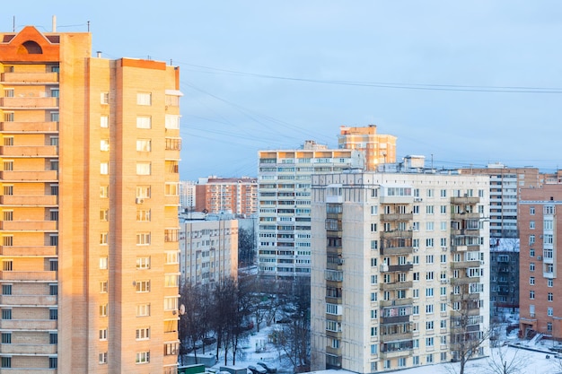 Sunrise over residential district in winter