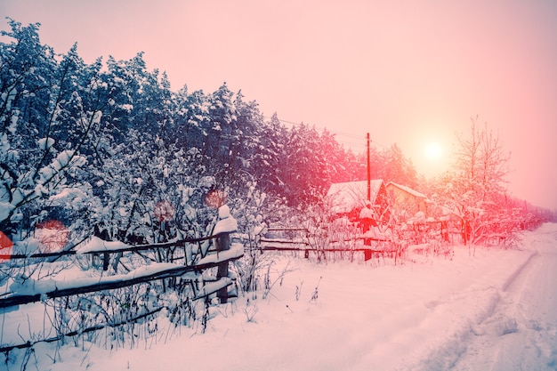 Sunrise over snowy village