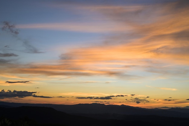 Sunrise or sunset beautiful sky sunlight shines sky with clouds colorful and mountain background Twilight cloud on sky