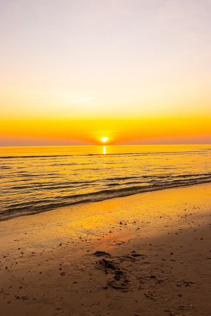 sunrise or sunset with twilight sky and sea beach