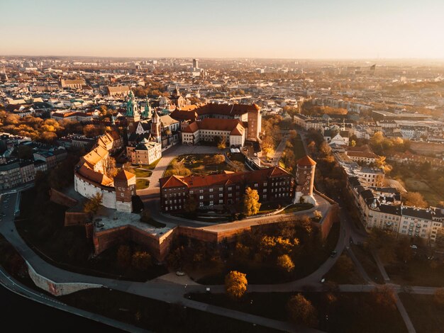 Sunrise view Wawel Castle and Gothic Cathedral in Cracow Poland Renaissance Sigismund Chapel with golden dome fortified walls