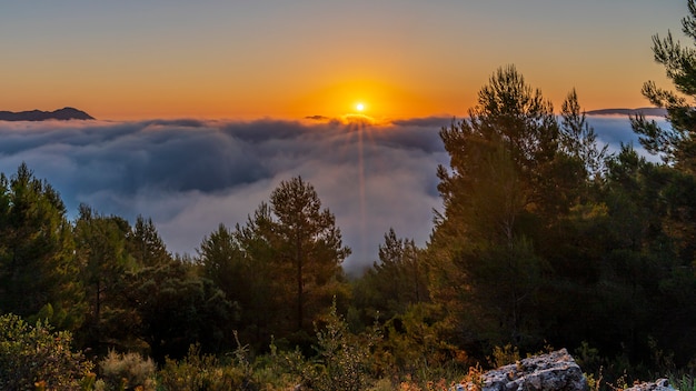 Sunrise views from the Montcabrer mountain in a day with clouds, Cocentaina.