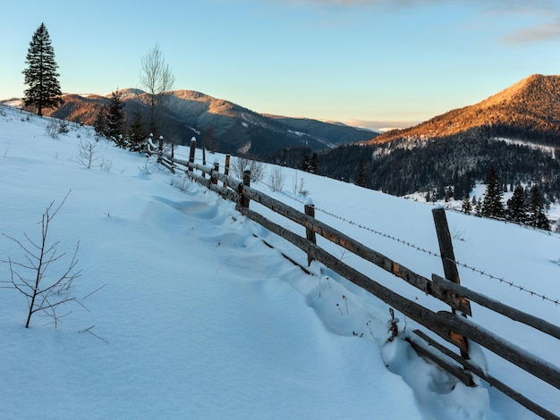 Sunrise winter Carpathian mountain village Zelene outskirts Verkhovyna Ukraine