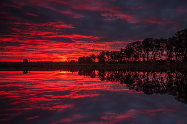 Sunrise with a beautiful sky over a small lake