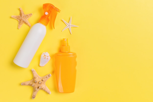 Sunscreen cream with starfish and seashells