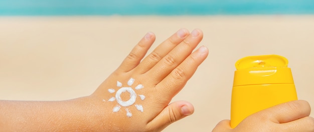 Photo sunscreen on the skin of a child.