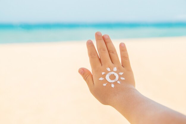 Photo sunscreen on the skin of a child