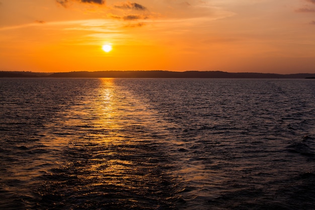 Sunset on Amazon river