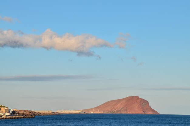 Sunset on the Atlantic Ocean with a Mountain in Background El Medano Tenerife Canary Islands Spain