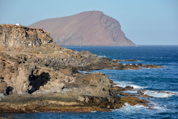 Sunset on the Atlantic Ocean with a Mountain in Background El Medano Tenerife Canary Islands Spain