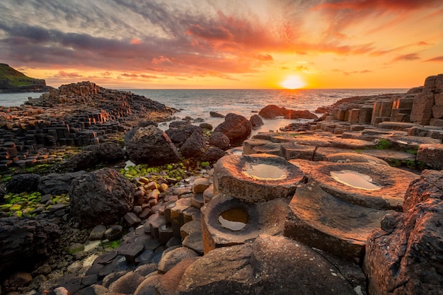 Sunset over basalt columns giants causeway county antrim northern ireland