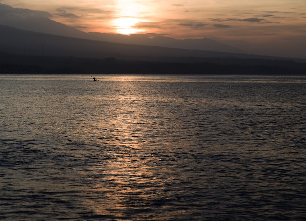 Sunset on the beach closed to Volcano