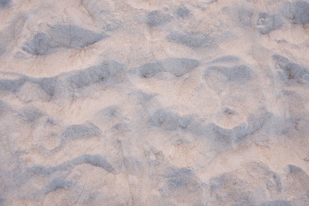 Sunset on the beach. Sand texture