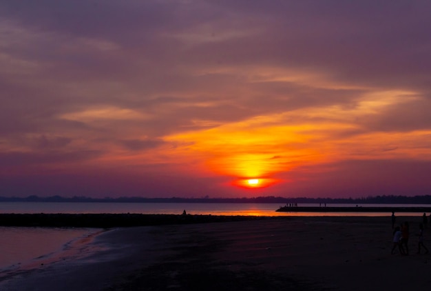 Sunset beach silhouette free styles in holiday water  sky and people