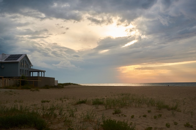 Sunset and beach sunset shoot. Dramatic sky with clouds