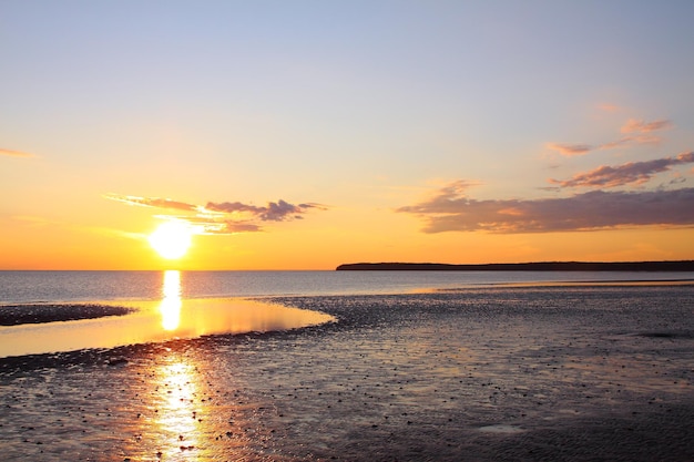 A sunset over the beach white sea russia