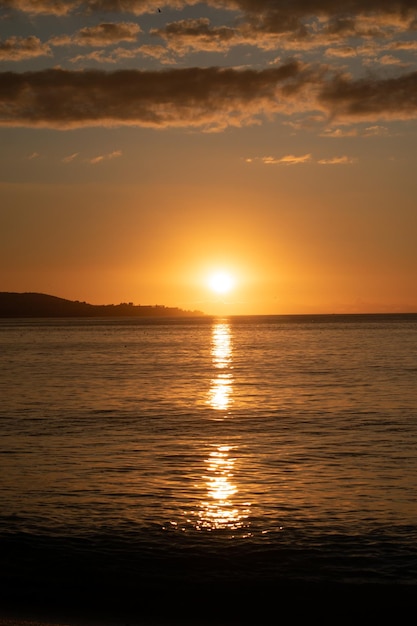 Photo sunset at the beach