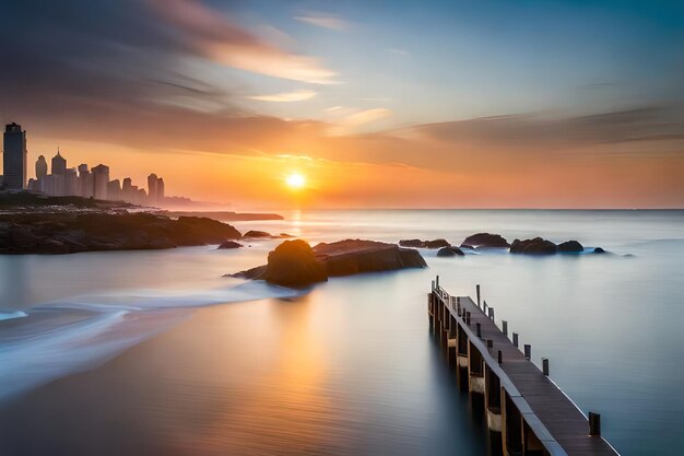 a sunset over a body of water with a pier in the foreground