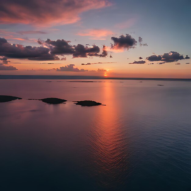 a sunset over a body of water with a sunset in the background