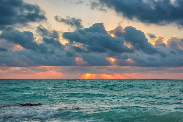 Sunset on the Caribbean Sea Clear sky with small clouds